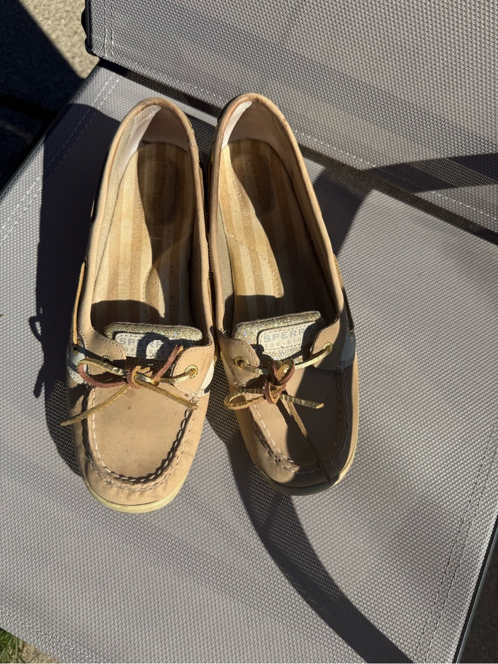 Women’s Sperry boat shoes with glitter accent
